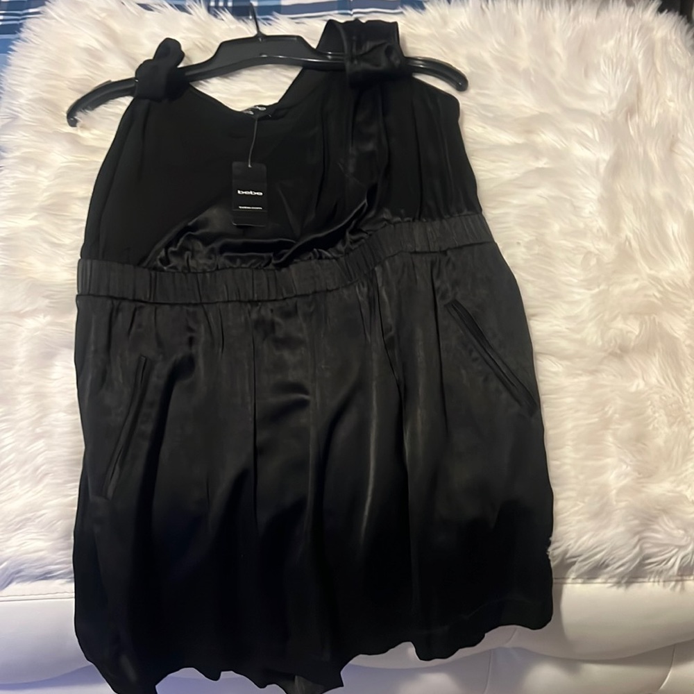 *NWT* bebe romper black with polyester and viscose material